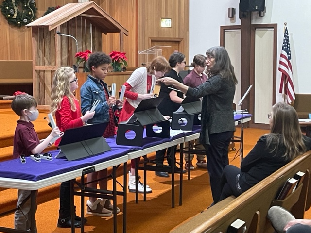 Bell choir performing